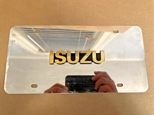 Etiqueta de matrícula de tocador de acero inoxidable con emblema con logotipo dorado Isuzu envío gratuito - Imagen 1 de 17