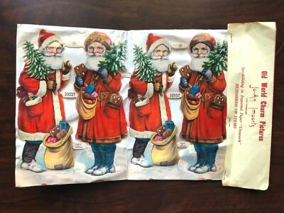 8 restos troquelados vintage de Navidad de Papá Noel adornos del viejo mundo Paul Zoecke Alemania Foto 1 de 4