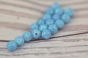 6 mm Blau Opal Perlen Rund Lose Labor Edelstein Mitte Gebohrt Loch Zwischenring 2 Stck. - Bild 1 von 3