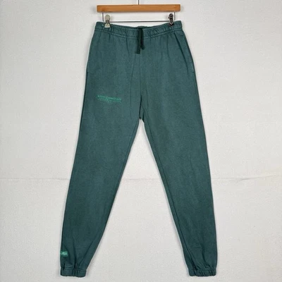 Pantalones deportivos Nike Sportswear Club Sanctuary polar verdes para hombre pequeños Foto 1 de 4