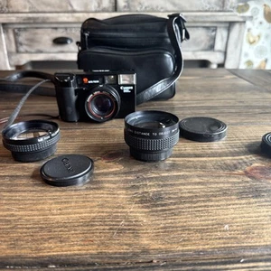 Película de enfoque automático Canon ML 35 mm para cámara de disparo automático SIN PROBAR + ESTUCHE + LENTES - Imagen 1 de 6
