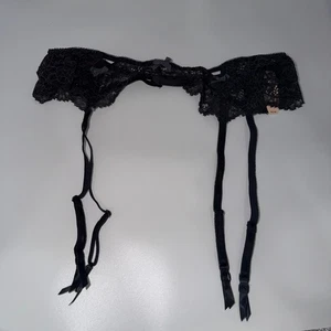Cinturón liguero de encaje negro con lazos Victoria's Secret M/L - Imagen 1 de 5