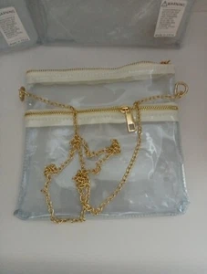 Klare Konzerttasche mit goldfarbenem Riemen. - Bild 1 von 6