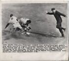 1948 Press Photo Cleveland Pickoff Play World Series Torgeson and Boudreau