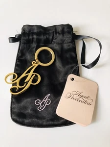 AGENT PROVOCATEUR GOLD KEYRING BRAND NEW IN POUCH - Picture 1 of 4