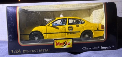Chevrolet Impala 1:24 diecast Chicago Taxi cabina amarilla Maisto Foto 1 de 4