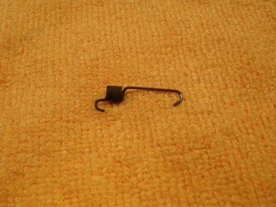 1971 - 1976 Cadillac  Front Rear Passenger Ash Tray Door Spring - Image 1 of 2