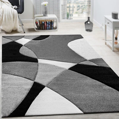 Tappeto Di Design Moderno Motivo Geometrico Taglio Sagomato In Nero Bianco - Immagine 1 di 4