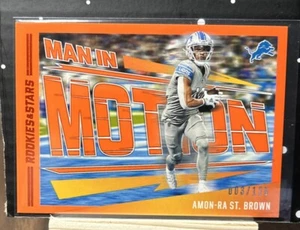 2023 Panini Rookies & Stars - Man in Motion orange #MM-1 Amon-Ra St. Brown - Bild 1 von 3