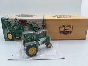 Die-Cast Metal John Deere Model A with Farmer - 50th Anniversary - ERTL Co. 1/64 - Picture 1 of 2
