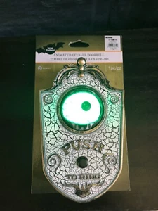 PORTA CAMPANELLO BULBO OCULARE ANIMATO PUNTELLO GEMMA HALLOWEEN LUCI VERDI SUONI PIPISTRELLO - Foto 1 di 10