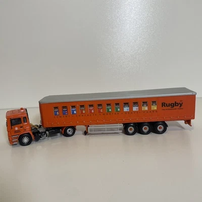 Corgi Modern Truck CC13503 VOLVO FM CURTAINSIDE RMC PACKED PRODUCTS RUGBY CEMENT - Image 1 of 4
