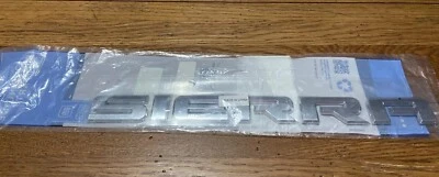 Placa de identificación emblema puerta trasera derecha izquierda GM 07-13 GMC Sierra OEM 15129653 Foto 1 de 2