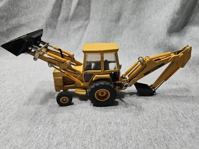 Retroexcavadora retroexcavadora Ertl Ford 555A 1/32 juguete de construcción fundido a presión Foto 1 de 4