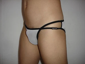 Slip tonga plume taille L/XL tissus très doux un peu transparent blanc sexy - Imagen 1 de 4