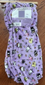 Neu mit Etikett Hello Kitty and Friends Halloween Überwurf Decke Plüsch lila 60”x70” - Bild 1 von 3