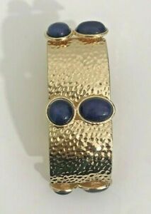 Tribal bracelet stretch gold tone with navy stones