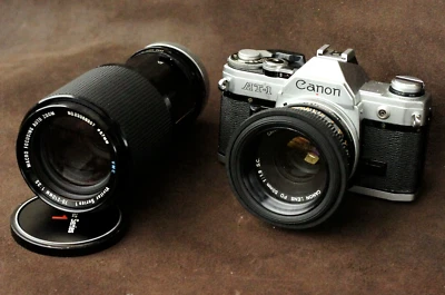 Cámara Canon AT-1 35mm+ Objetivo Canon FD 50mm 1:18 + Vivitar 1 VMC 70-210 Zoom Macro Foto 1 de 4