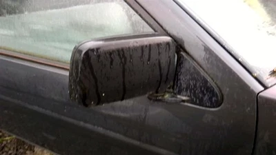 Espejo retrovisor lateral pasajero puerta manual negro para camioneta Nissan 86-97 28002674 Foto 1 de 4