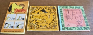 PEANUTS HERE COMES SNOOPY, HAPPINESS IS A WARM PUPPY & COOK BOOK PAPERBACK - Picture 1 of 17