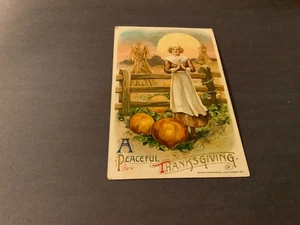 John Winsch~1911 A Peaceful Thanksgiving Pilgrim Moon Pumpkins Embossed Postcard - Picture 1 of 2