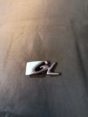 Placa de identificación emblema parachoques trasero Ford Taurus GL 1996-1999 OEM F6DZ17E939AA Foto 1 de 4