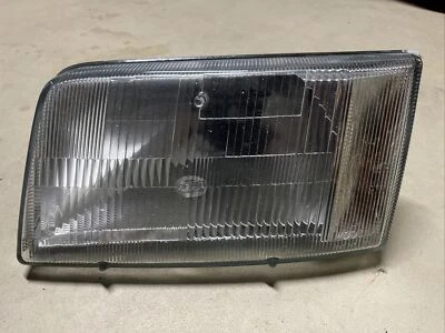Faro delantero izquierdo conductor Audi 100 91-94 C4 Hella V6 OEM Foto 1 de 4