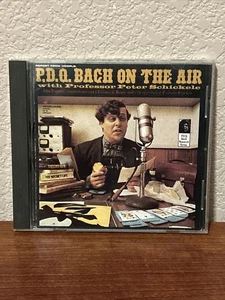 Peter Schickle- Report From Hoople;  P.D.Q. Bach On The Air With..- CD- - Imagen 1 de 3