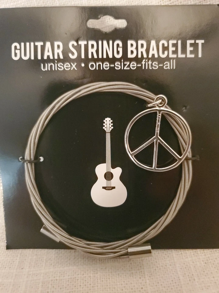 PULSERA DE CUERDA DE GUITARRA CON ENCANTO SIGNO DE LA PAZ Foto 1 de 1