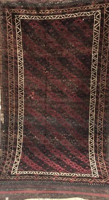 AN ANTIQUE BALUCHSTAN TRIBAL RUG Foto 1 de 4