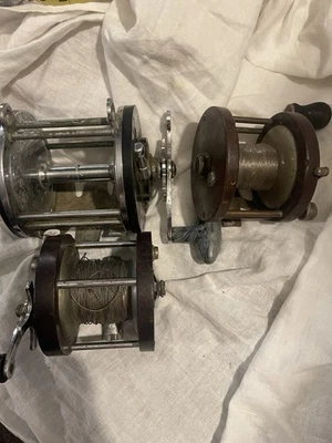 Lote de carretes de pesca vintage Ocean City 167 Abbey Imbrie 250 y Surf King tal cual Foto 1 de 4