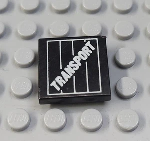 LEGO Black 2x2 Tile with Truck Transport Pattern - Picture 1 of 1