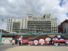 PHOTO  THE BRIGHTON GRAND HOTEL  AS SEEN FROM THE BEACH. MOST KNOWN FOR THE IRA