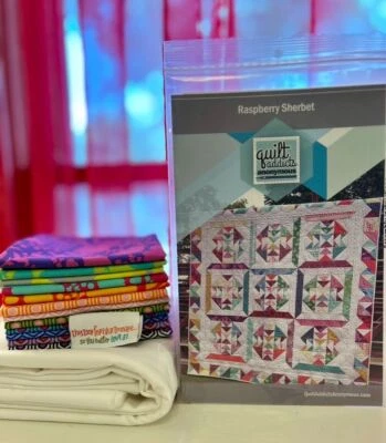 RED MONKEY QUILT COMPANY Raspberry Sherbet quilt kit featuring Tula Pink True Colors fabrics