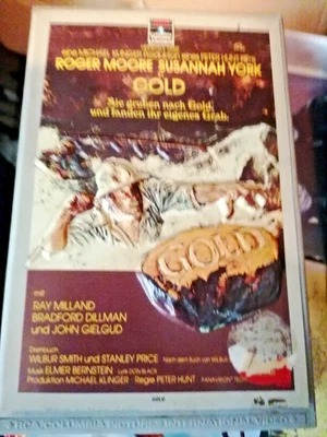 VHS Rarität: GOLD (1974) MIT ROGER MOOR MIT  3D RELIEF COVER - Bild 1 von 2