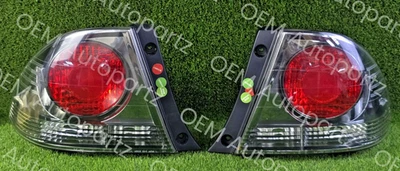 Par de luces traseras izquierda y derecha OEM usado Lexus Altezza IS200 IS300 SXE10 Foto 1 de 4