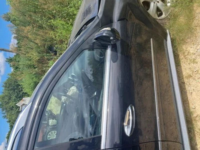 Mercedes-Benz GL450 2010 pasajero puerta delantera carcasa usado negro SUV de 4 puertas Foto 1 de 4