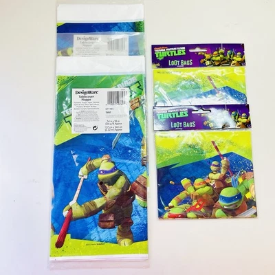 NEW 2012 Teenage Mutant Ninja Turtles Plastic 2 Tablecovers & 16 Loot Bags - Image 1 of 4