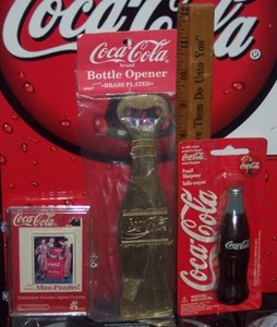 COCA - MINI APRIBOTTIGLIE E TEMPERAMATITE IN OTTONE PLACCATO MARCA COLA - Foto 1 di 3