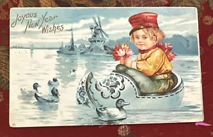 Geprägte Postkarte Ein frohes neues Jahr niederländischer Junge im Schuh 1898 International Art Co - Bild 1 von 2