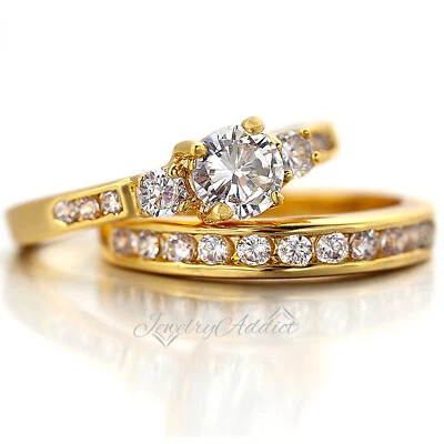 JUEGO DE ANILLOS DE COMPROMISO DE SAN VALENTÍN SIMULANTE DIAMANTE TRILOGÍA GF ORO 14K Foto 1 de 3