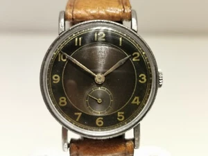 VINTAGE RARE  WW2 ERA SWISS MEN'S MECHANICAL 34mm WATCH "RIVOLI" /TWO TONE DIAL - Picture 1 of 10