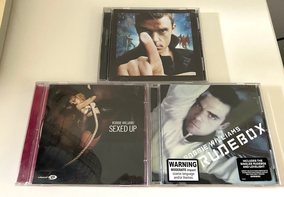 Robbie Williams Bundle of 3 CD Music Album Lot - Image 1 of 4