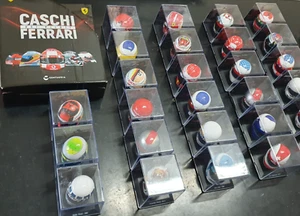 CASCHI DEI PILOTI FERRARI 1:5 PROTAGONISTI DI CORSE LEGGENDARIE - Imagen 1 de 64