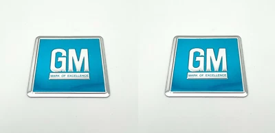Pair "GM" Turquoise Metal Foil Door Jamb Decals Badges For 1964-1967 Chevy - Image 1 of 4