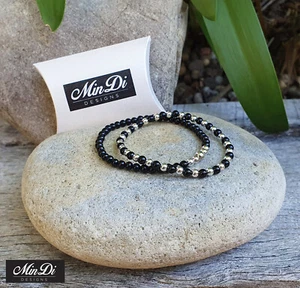 Juego de 2 pulseras elásticas de plata de ley con ónix negro. - Imagen 1 de 4