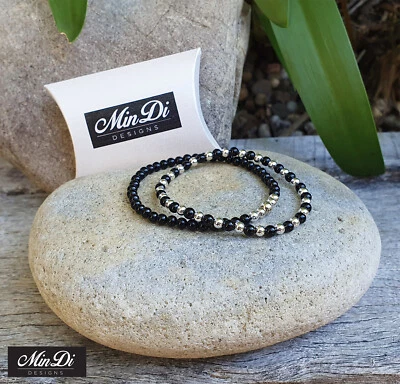 Set di 2 bracciali elasticizzati in argento sterling con onice nera. - Immagine 1 di 4