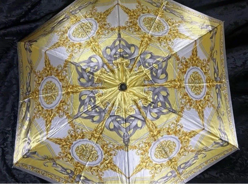 Paraguas Gianni Versace dorado Foto 1 de 4