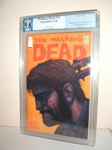 THE WALKING DEAD 12 PGX 9.8 WHITE PAGES FIRST PRISON - Picture 1 of 6