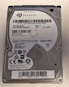 Disque dur Seagate ST2000LM003 2 To - 2,5" SATA - 5400 tr/min - Utilisation 10 heures - 2507171633 - Photo 1/4